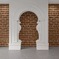 White Ornate Arched Doorway With Carved Pillars Against Red Brick Wall