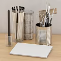 Silver And White Desk Organizers With Stationery Tools And Scented Candle