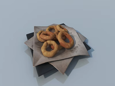 Crispy Golden Pretzels Placed on Black Plate with Parchment Paper 3d model