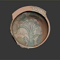 Ancient Painted Clay Bowl with Broken Fragments and Decorative Leaf Patterns
