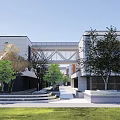 Modern Connected Building Complex With Green Roofs Lush Lawns And Roads