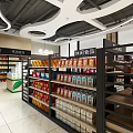 Well Organized Supermarket Interior With Shelves Stocked Full Of Snacks Beverages And Grocery Products