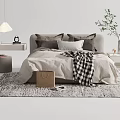 Cozy Double Bed Interior With Gray Quilt Pillows Plaid Blanket Bedside Tables Lamp And Plants On Rug
