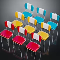 Colorful Modern Chairs With Red Yellow Blue Seats White Backs And Metal Legs