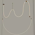 Modern Curved LED Chandelier Design With Gold Accents On White Wall Interior