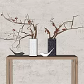 White and Black Vases with Red Berry Branches on Wooden Table with Small Bird Decor