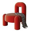 Modern Red Leather Accent Chair With Curved Arms Legs And Plaid Blanket