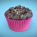 Delicious Chocolate Cupcake With Chocolate Frosting And Colorful Sprinkles In Pink Paper Liner