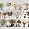Decorative Vases With Dried Floral Arrangements On Multi Tiered Shelf