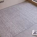 Gray And White Geometric Pattern Square Rug For Modern Living Room With Open Magazine