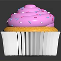Sweet Cupcake Featuring Pink Frosting Colorful Sprinkles in White Paper Liner on Black Background