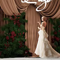 Elegant Photo Spot With Brown Curtains Lage Sign White Dress Green Plants And Red Berries