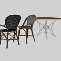 Round Wooden Top Table With White Metal Legs And Wicker Rattan Chairs Set