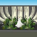 Elegant Wooden Sculpted Wedding Scene With White Dress Green Plants And Flowers
