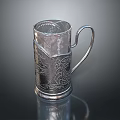 Silver Engraved Mug With Transparent Body And Decorative Handle For Household Use