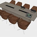 Modern Conference Table With Brown Chairs And Meeting Devices On Top