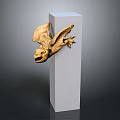 Mystical Game Movie Character Golden Sculpture Spreading Wings On White Cubic Pedestal