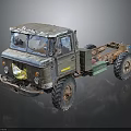 Old Worn Truck With Large Tires Exposed Chassis And Rustic Exterior