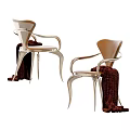 Modern Dining Chairs With Metal Frame Armrest Design And Brown Blanket Decor