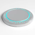 Round Silver Device With Blue LED Lights And Circular Platform Design