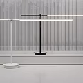 Modern Minimalist White And Black Desk Lamps With Slim Adjustable LED Arms And Window Blinds Urban View