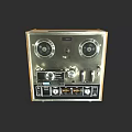 Vintage Audio Tape Recorder With Dual Reels Control Knobs And Retro Design