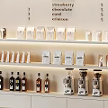 Elegant Café Interior With Marble Countertop And Display Shelves For Drinks And Bakery Items