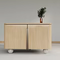 Modern Light Wood Sideboard With Two Doors Decorative Legs And Vase With Green Plant