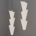 Two White Spiral Cone Pendant Lights Hanging In Modern Interior Space 3d model