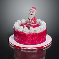 Red Christmas Cake with Santa Claus Decoration White Cream Border and Merry Christmas Base Tray