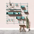 Light Blue Wall Cabinets On Pink Wall With Green Plants And Wooden Stool