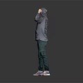 A Man In Gray Hoodie Green Pants White Sneakers Flexing Arms Showing Muscles