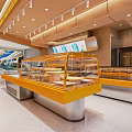 Modern Dessert Shop Interior With Glass Display Cases Yellow Counters And Bright Lighting