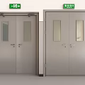 Double Silver Emergency Exit Doors with Glass Panels and Green Exit Signs