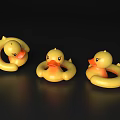 Three Yellow Rubber Ducks in Different Poses on Black Background 3d model