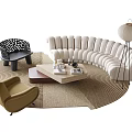 Curved Beige Upholstered Sofa And Coffee Table Set With Area Rug And Floor Lamp