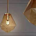 Modern Geometric Pendant Lights With Amber Glass Shades And Golden Metal Frames Against Gray Wall