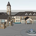 Large Brick Building Featuring Clock Tower And Multi Story Exterior Design