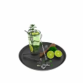 Fresh Lime Mint Drink With Ice Cubes And Bar Tools On Black Tray