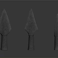 Three Metallic Arrowheads With Shiny Surfaces Displayed On Dark Background