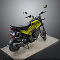 Yellow and Black Motorcycle with Black Seat and Rearview Mirrors on Display Platform