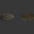 Two Metallic Ancient Shields With Ornate Studs And Decorative Patterns As Historical Weapon