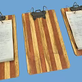 Three Wooden Clipboards With Metal Clips And Papers On Blue Background