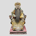 Traditional Chinese Figure Sculpture Carving With Ornate Robes Long Beard Golden Crown And Red Base