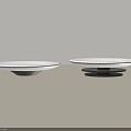 Two White Ceramic Dishes With Black Bases On Light Surface Minimalist Design