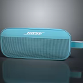 Bose Light Blue Portable Bluetooth Speaker With Hand Strap And Compact Design