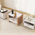 Three Modern Decorative Cabinets In Living Room Corner With White Gold Design And Decorative Items