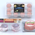 Gourmet Chocolate Truffles With Rich Filling And Fresh Beef Patties In Packaged Containers