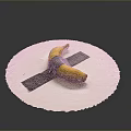 Yellow Banana Taped with Gray Tape Crossed on White Round Paper Against Gray Background