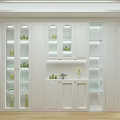 Modern White Wine Cabinet With Glass Doors And Green Bottles